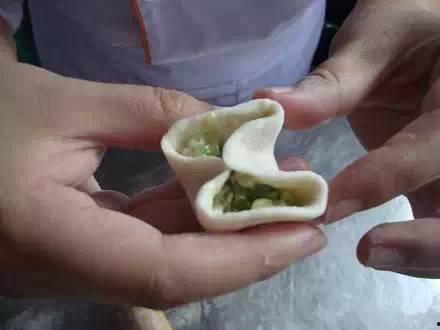 东北饺子的包法视频,一招掌握传统美味